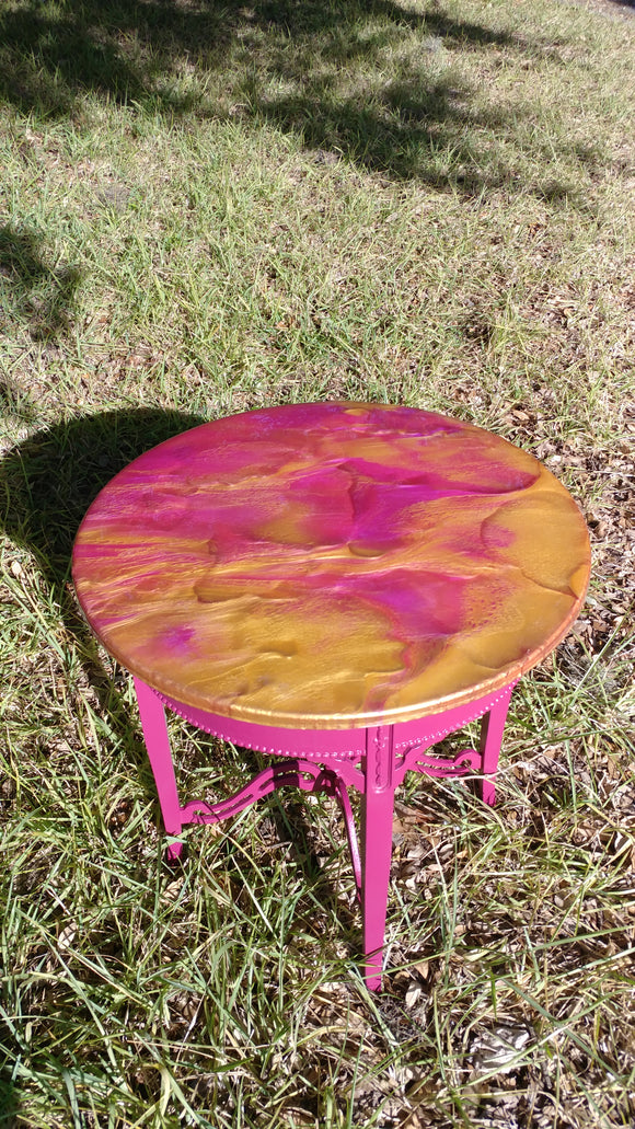 pink and gold epoxy table.